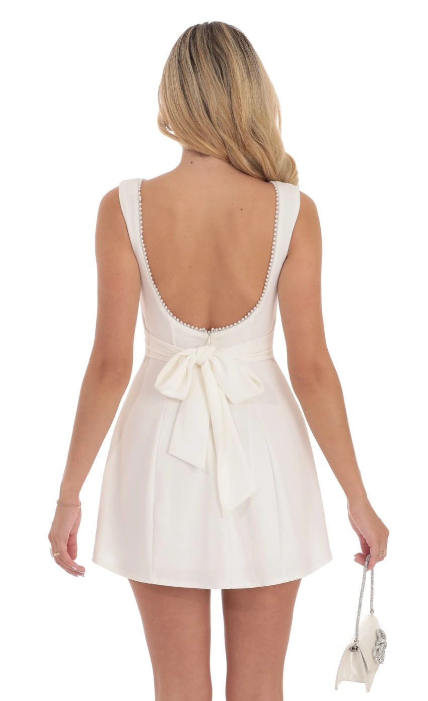 DingJi Wedding Charming Simple Short Pearl Backless A-line Homecoming Dresses